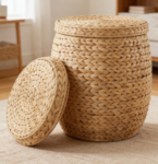 Round woven storage basket with lid, suitable for organizing clothes or blankets